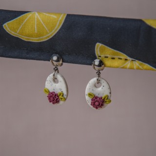 Clips ovale fleurs violettes